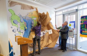 unveiling mural at Cannell Library's 25th anniversary