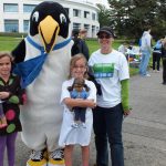 kids and mom with Oswald at Healthy Penguin Walkabout