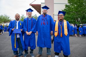Raymond Gutierrez graduating with Diesel Tech friends