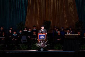 John Deeder gives speech at Commencement