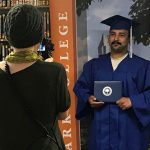 graduate at Larch Corrections holds diploma
