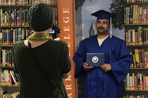 graduate at Larch Corrections holds diploma