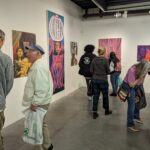 Dozens gathered at Archer Gallery for the opening reception of the Art Student Annual exhibit on June 4.