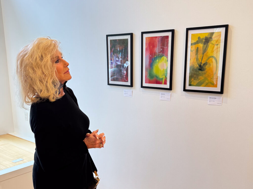 person looks at art