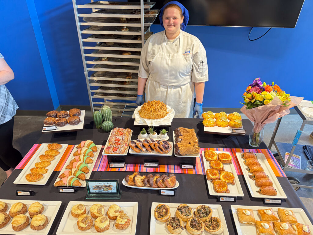 person in front of pastry