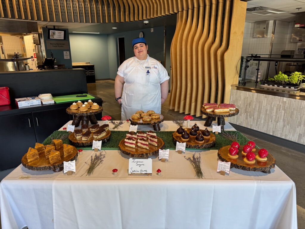 person in front of pastry