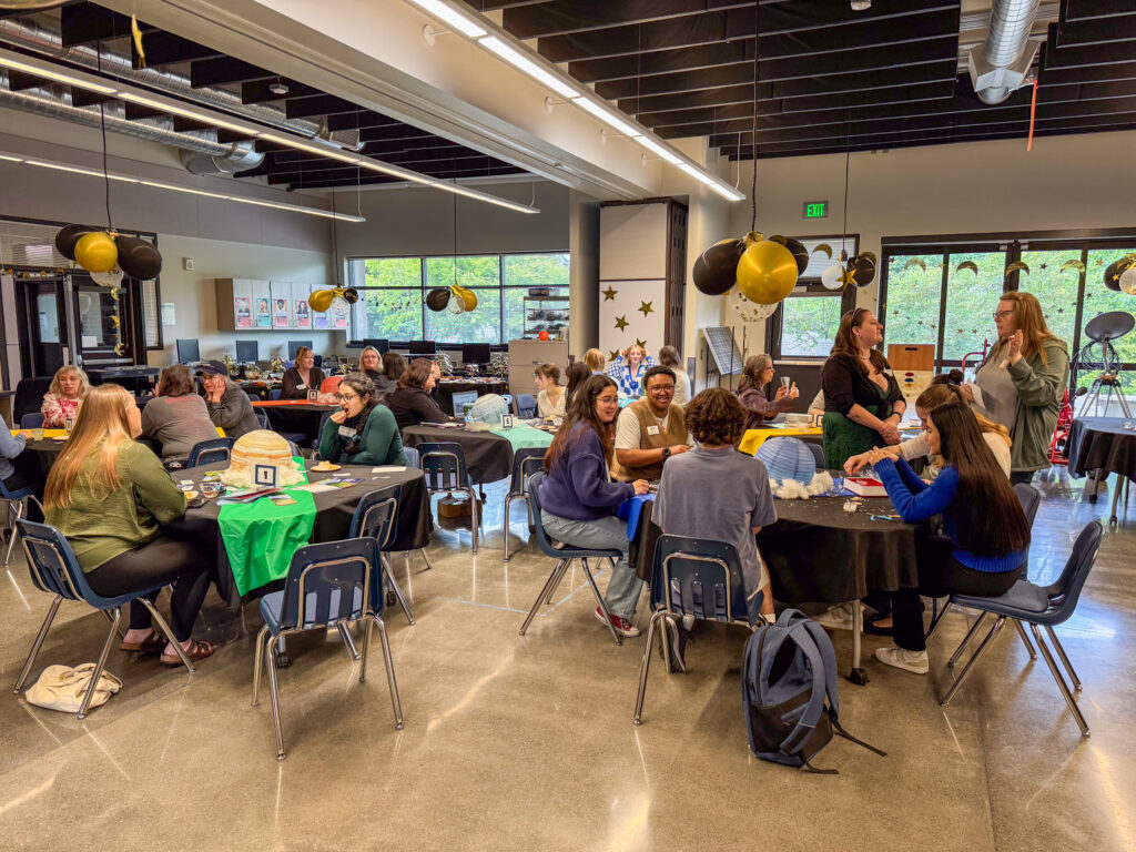 several people at large round tables