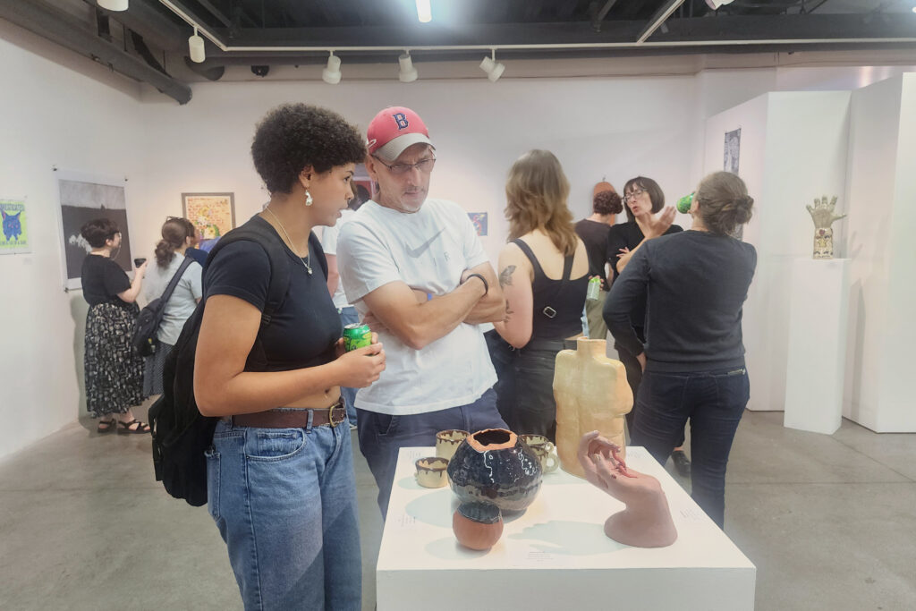 two people in art gallery
