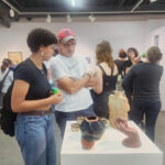 two people in art gallery