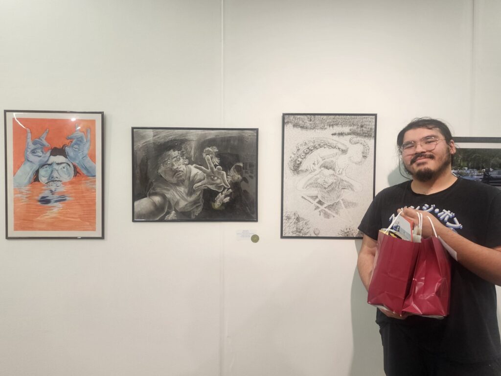 person with art on wall