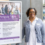 person with poster