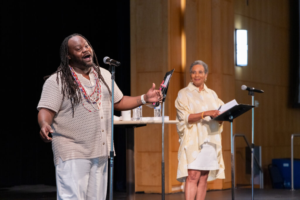 two people on stage