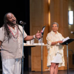 two people on stage