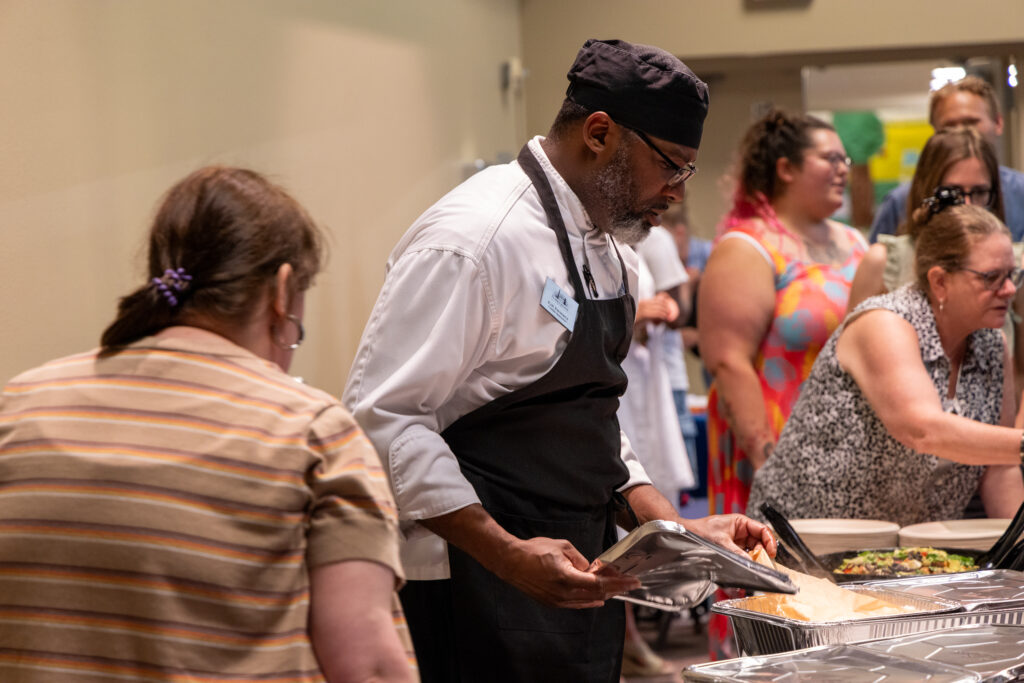 Person putting out food